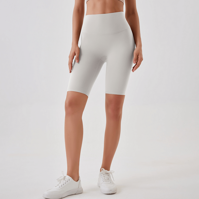 Athletic women's tight shorts with high waist, comfortable nylon blend, perfect for running and yoga, white color, SF1667.